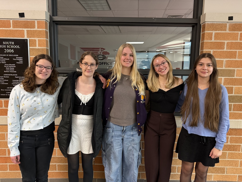 Members of the Sheboygan Falls High School Forensics posing as they compete in the Port Washington tournament..