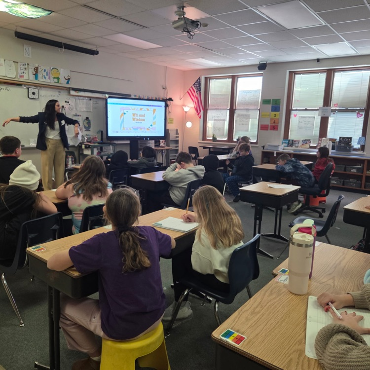 students listening to guess speaker, Representative Lindee Brill