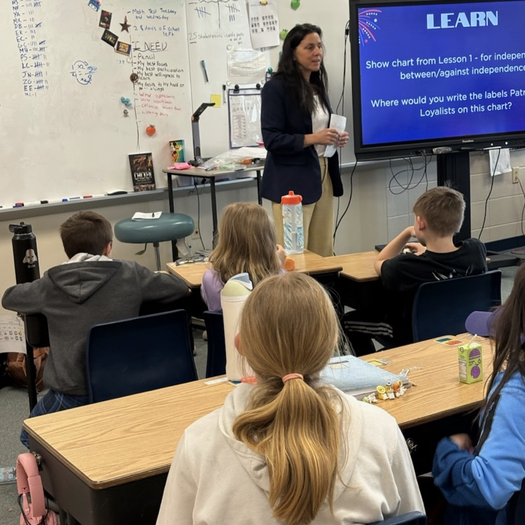 students listening to guess speaker, Representative Lindee Brill