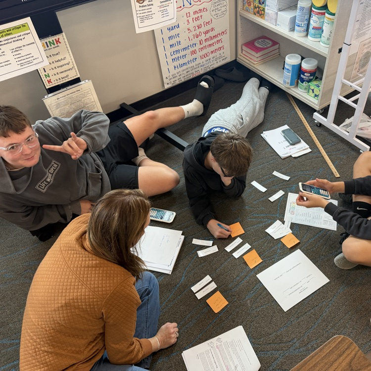 Mrs. Gehri asking how students figured out their categories
