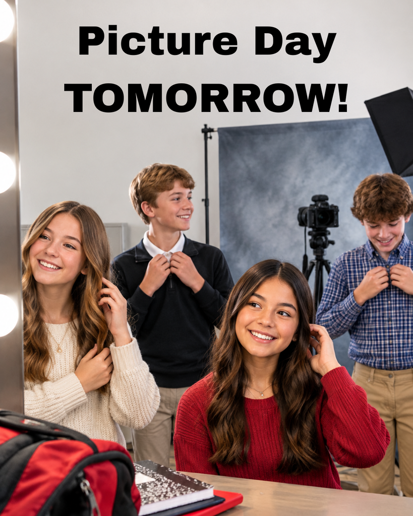 Four children pose for a picture in front of a studio backdrop with "Picture Day Tomorrow!" text.