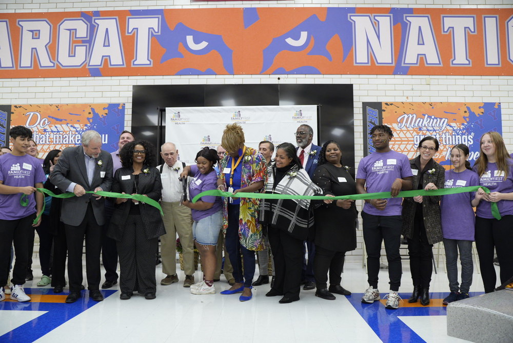 students and community partners cut the ribbon on the new WPSHS Family First Health Center 