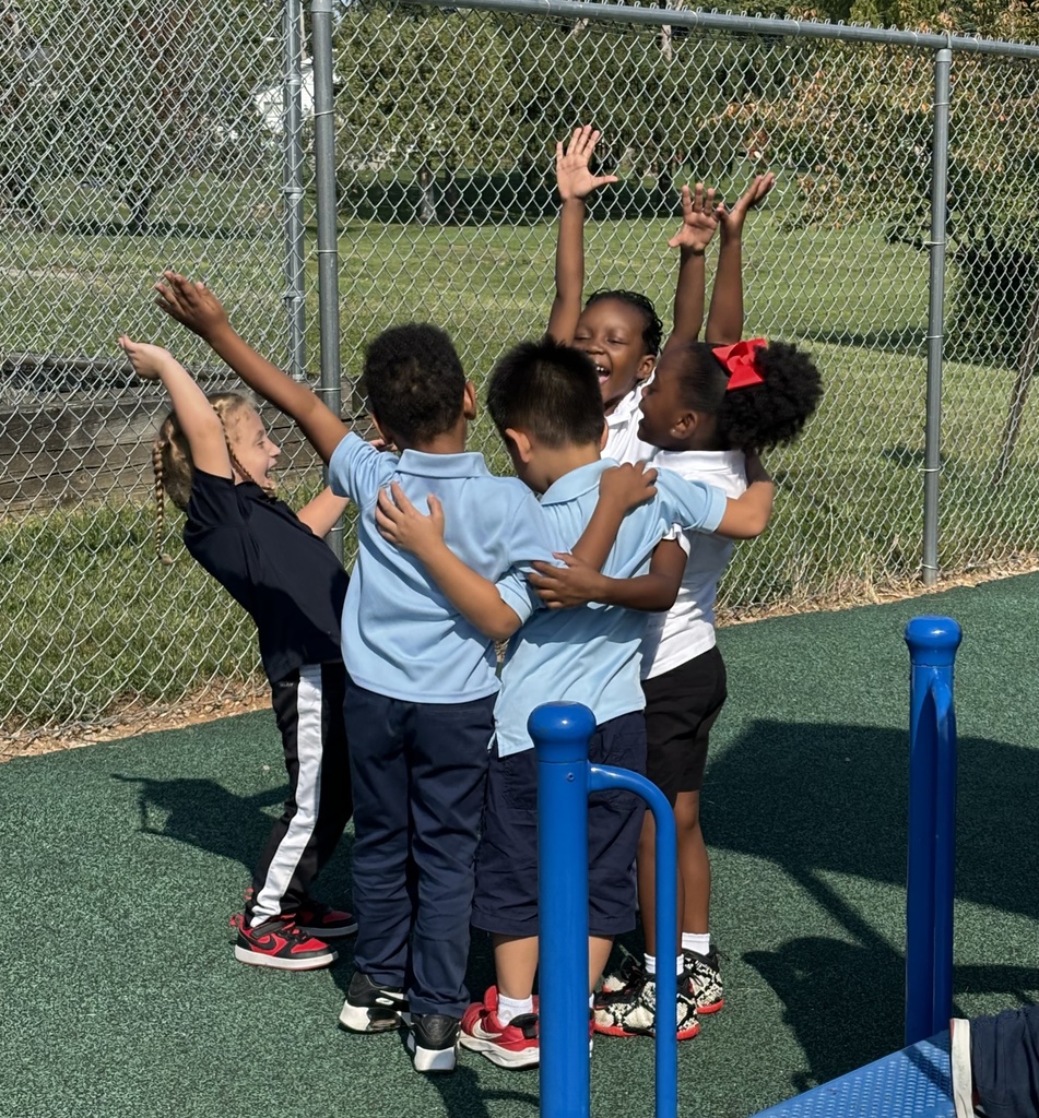 Pre-K students at Devers PK-8 outside during recess
