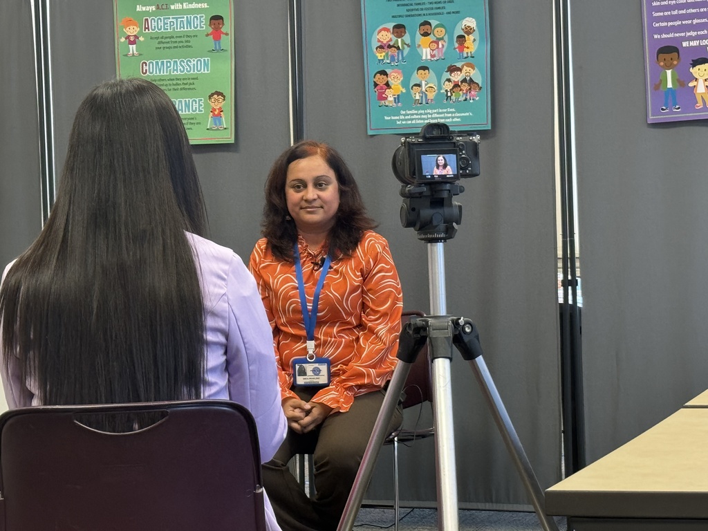 Member of the welcome center being interviewed by Fox 43