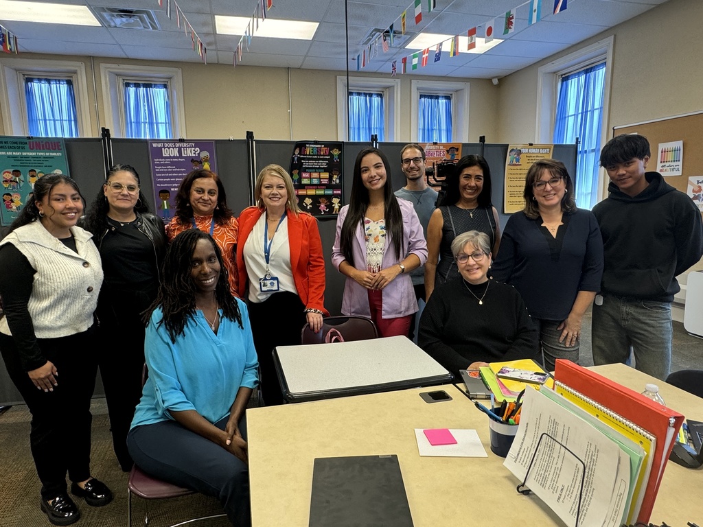 Members of the welcome center smlining