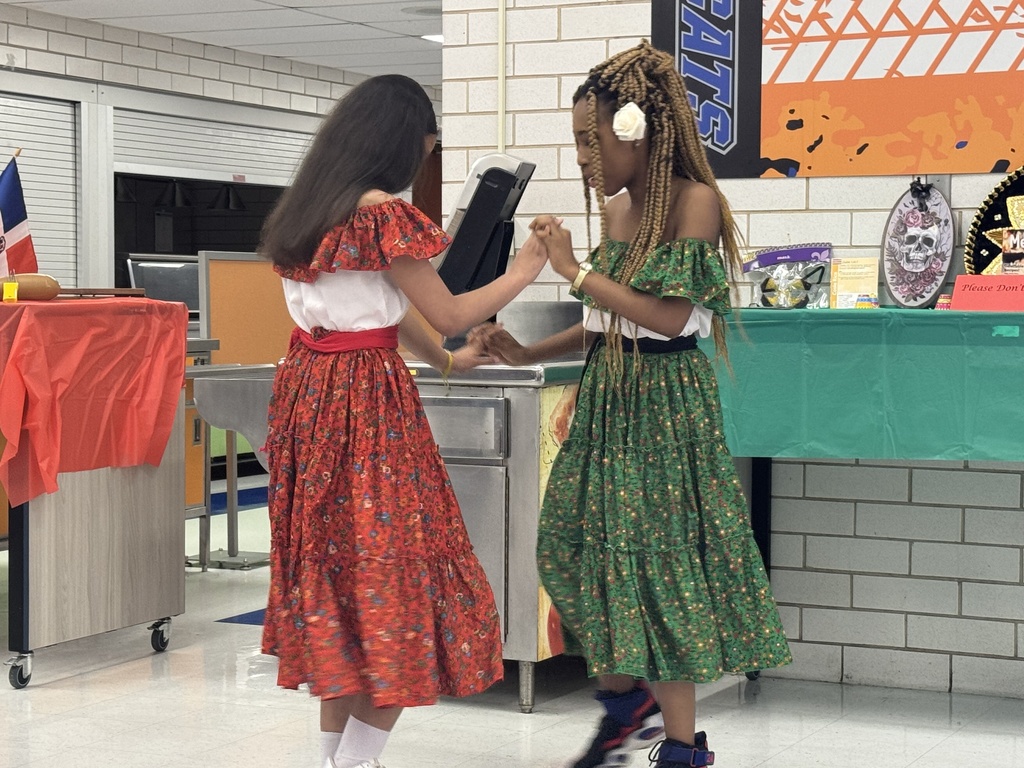 Students participating at the Hispanic Heritage Month celebration