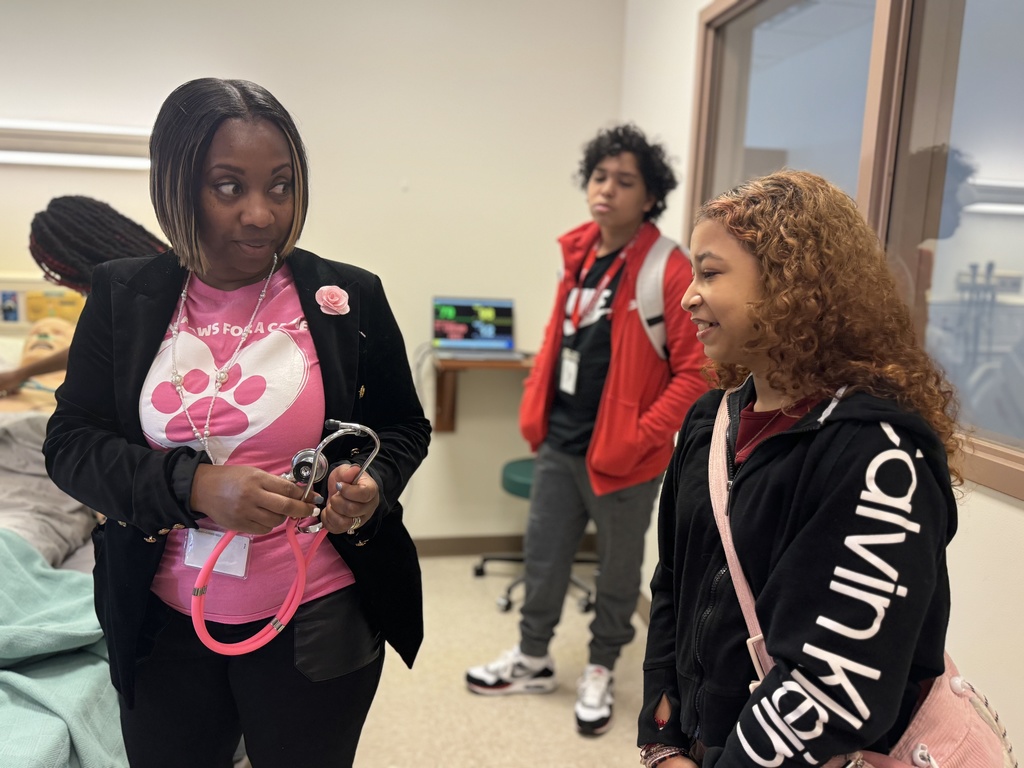 Students and adults participating in interactive activities at York College of Pennsylvania