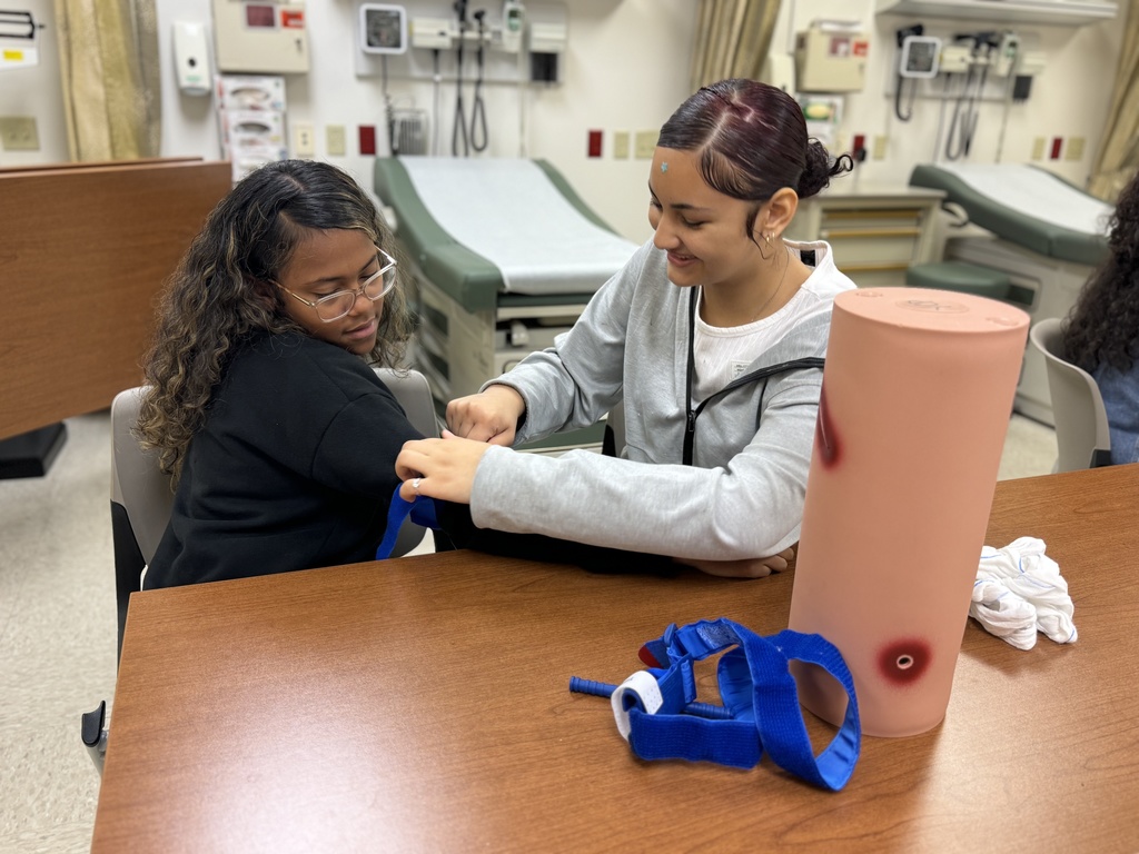 Students and adults participating in interactive activities at York College of Pennsylvania