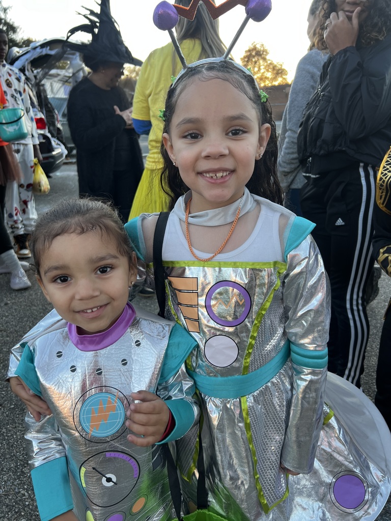 Student and families participating at their school's trunk or treat outside