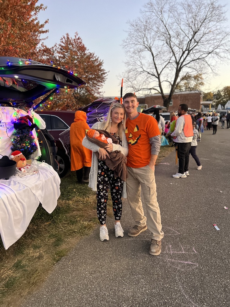 Student and families participating at their school's trunk or treat outside