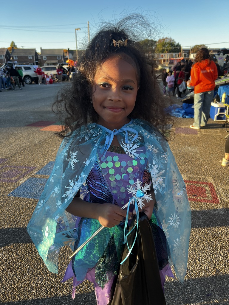 Student and families participating at their school's trunk or treat outside