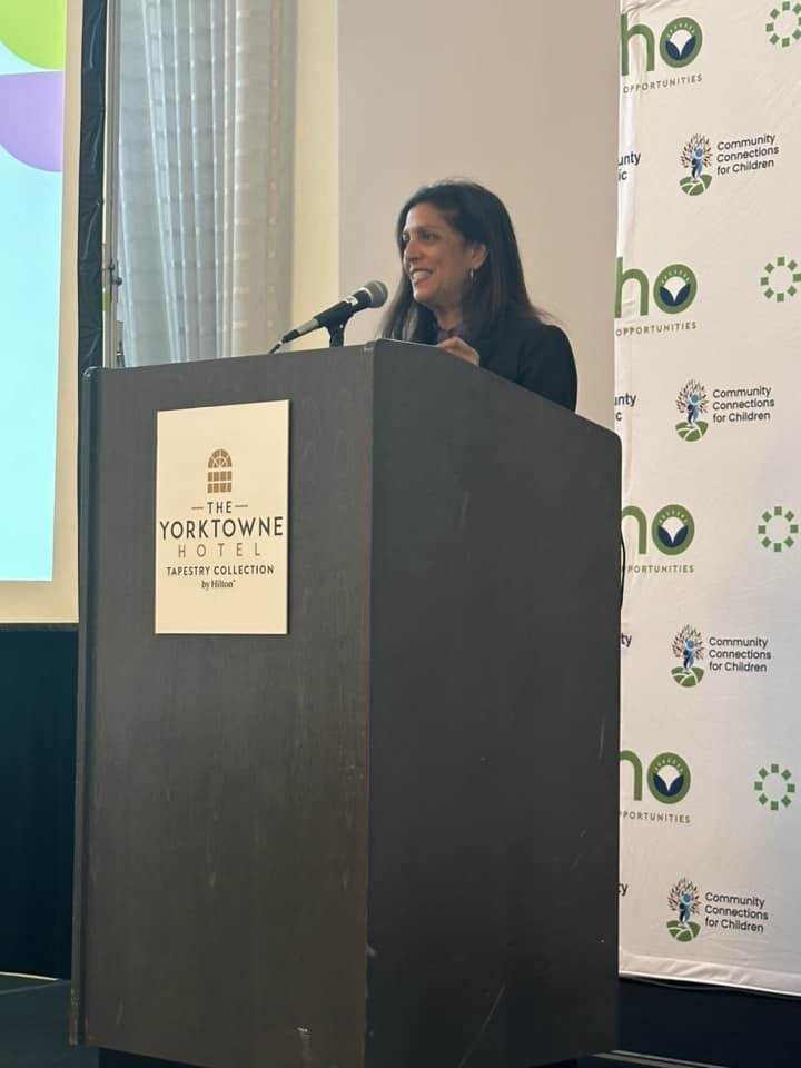 Guest speaker at a podium