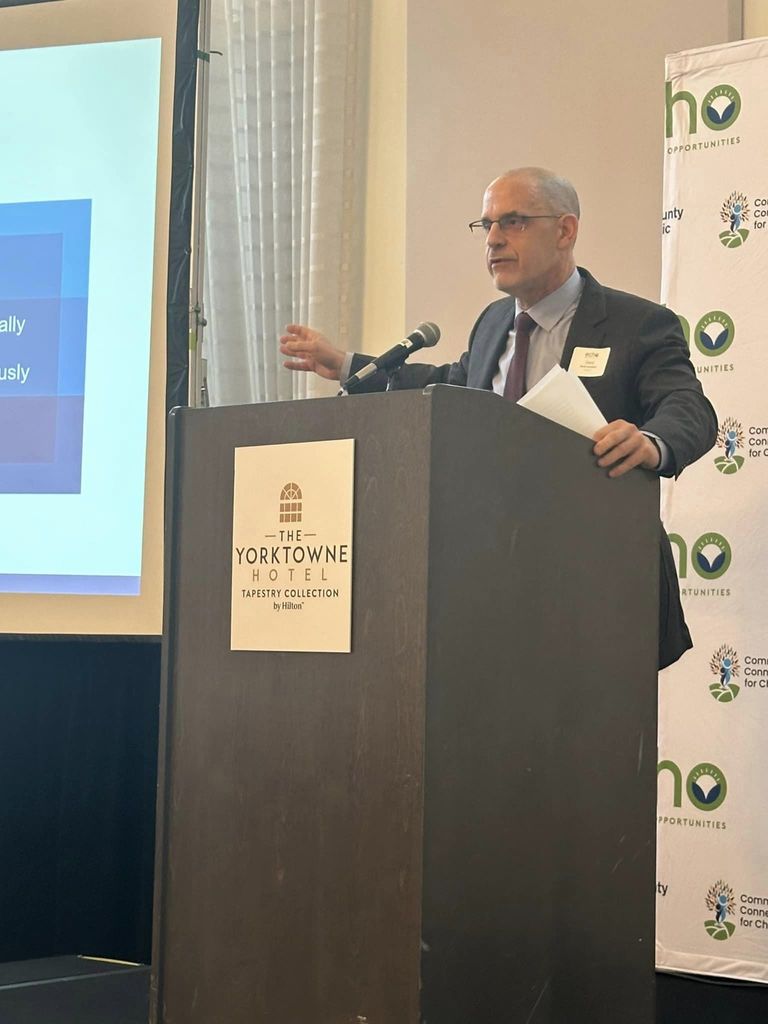 Guest speaker at a podium