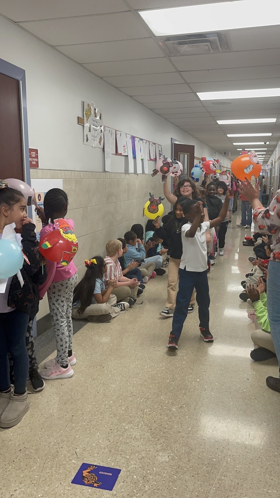 Students cheering with balloons