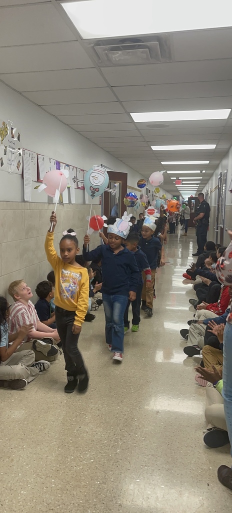 Students cheering with balloons