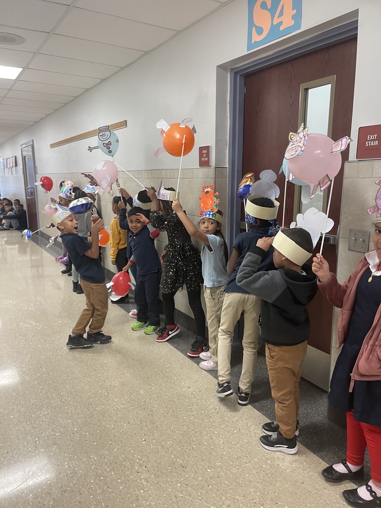 Students cheering with balloons