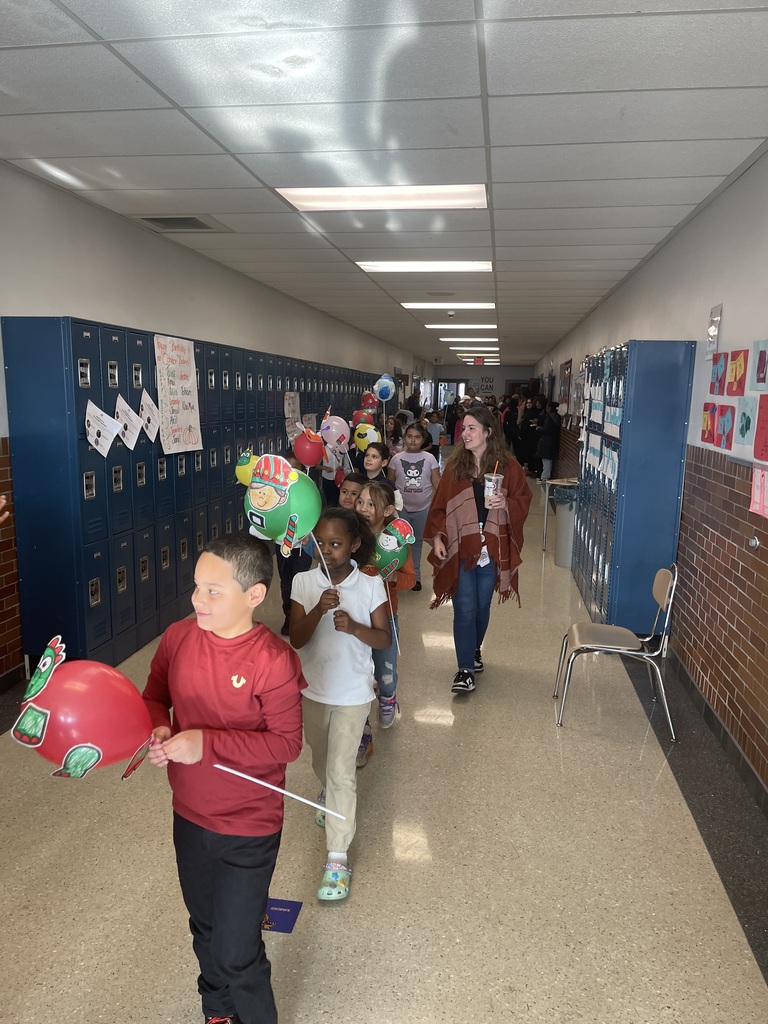 Students cheering with balloons