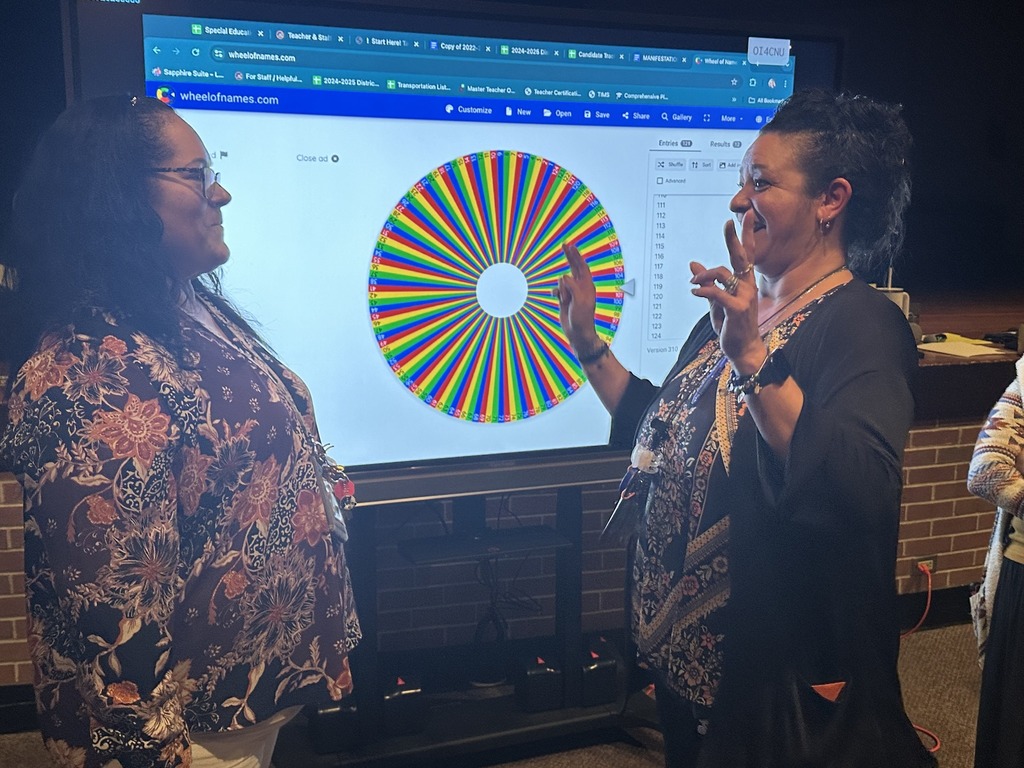 Two people smiling at each other