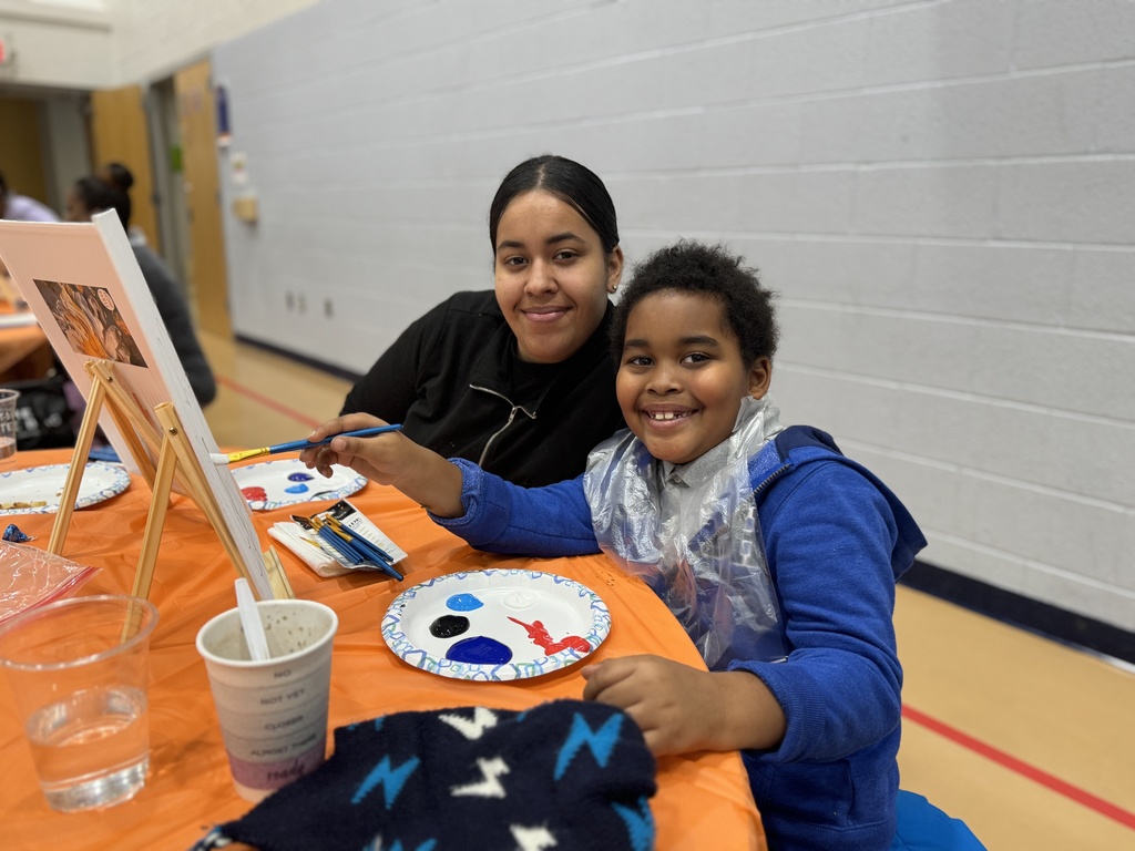 Families enjoying Ferguson's Coco and Canva event