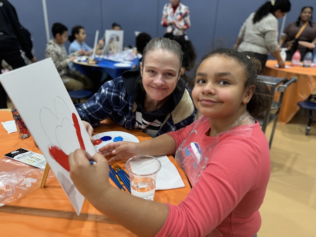 Families enjoying Ferguson's Coco and Canva event