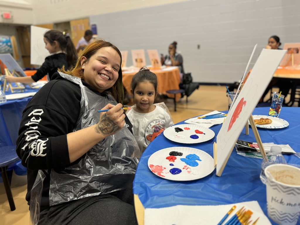 Families enjoying Ferguson's Coco and Canva event