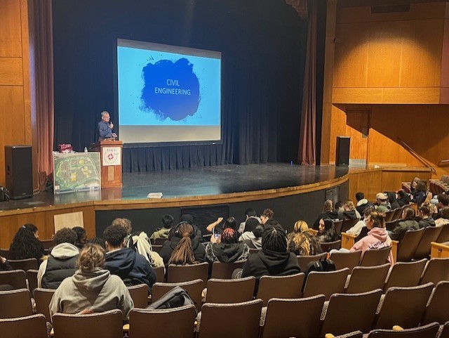 A group of students learning in a classroom 