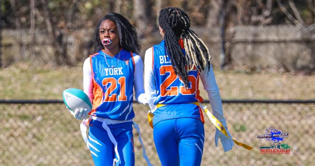 A group of students playing a sport