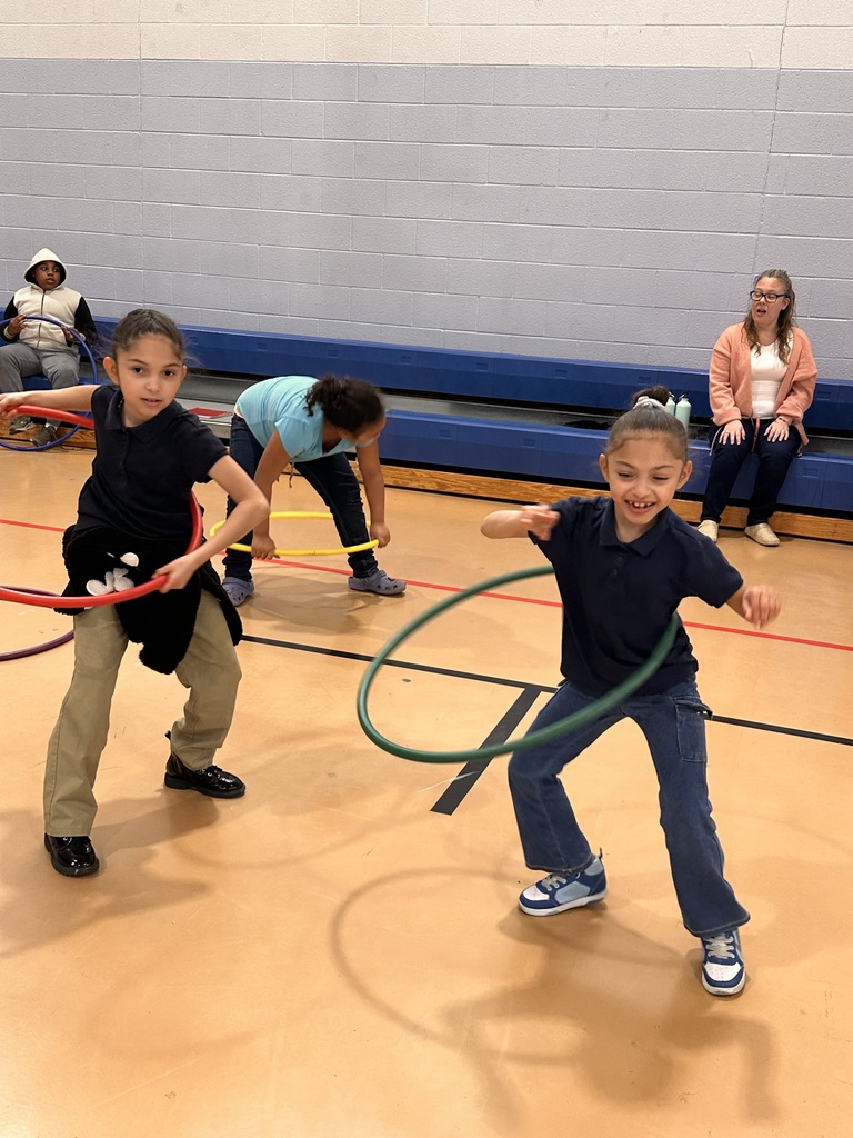 Two girls hula hooping
