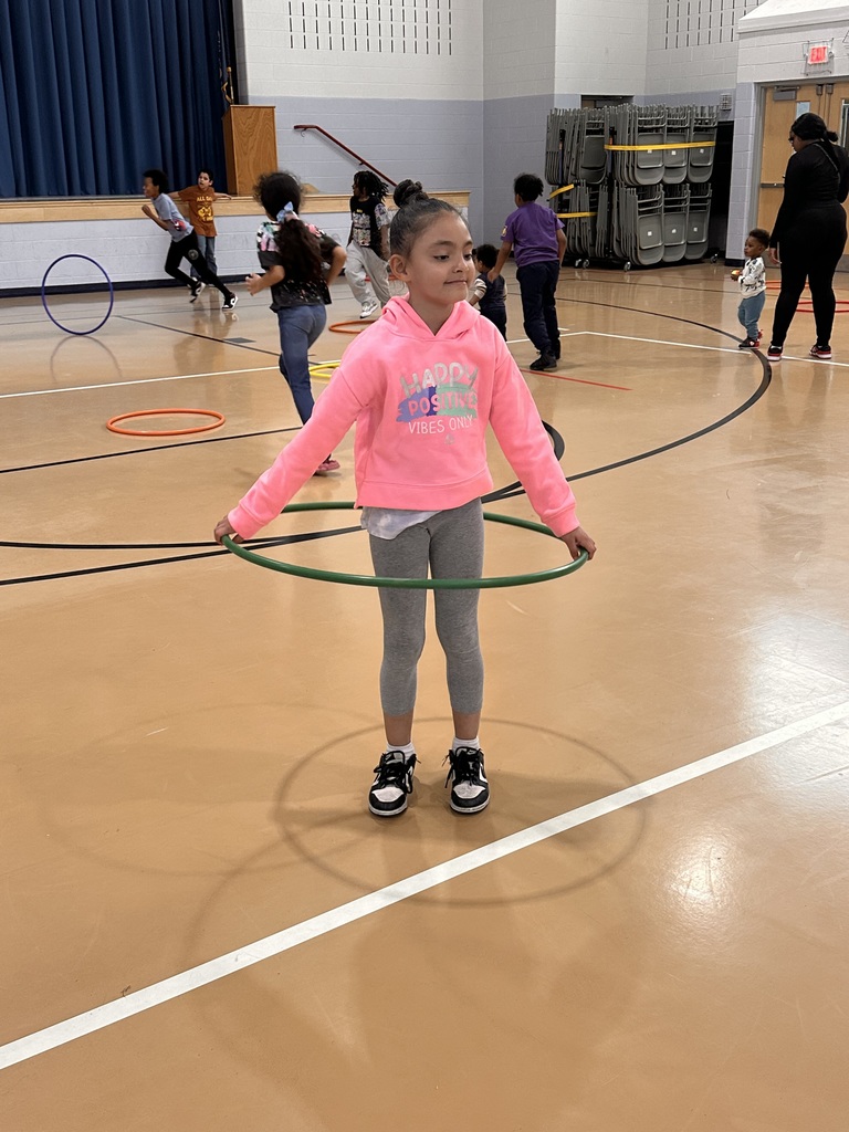 A girl hula hooping