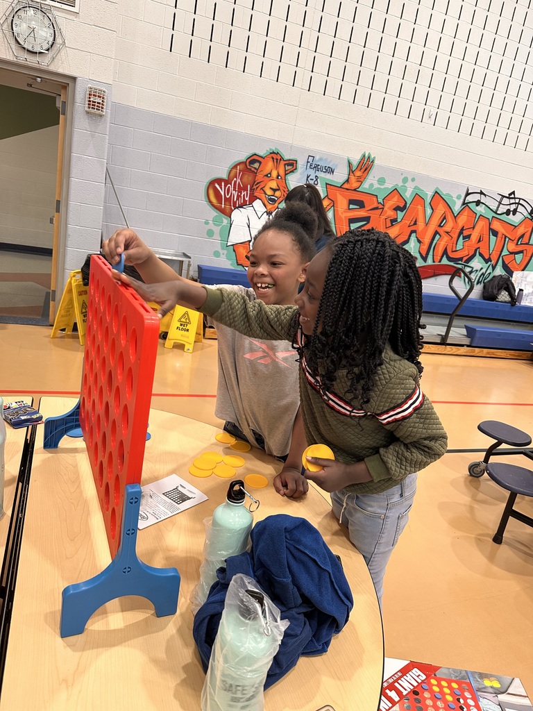 Two students playing a game