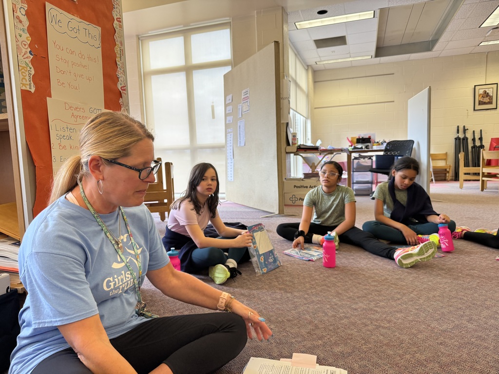 Group of people sitting in a circle