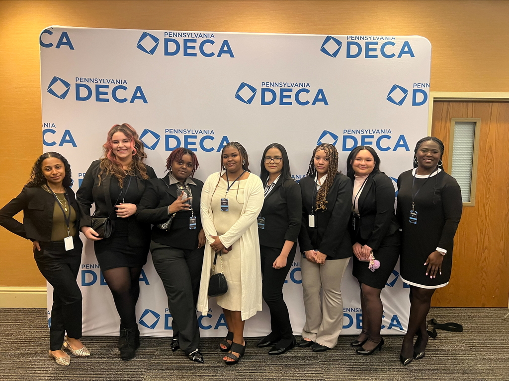 Group of people posing and smiling