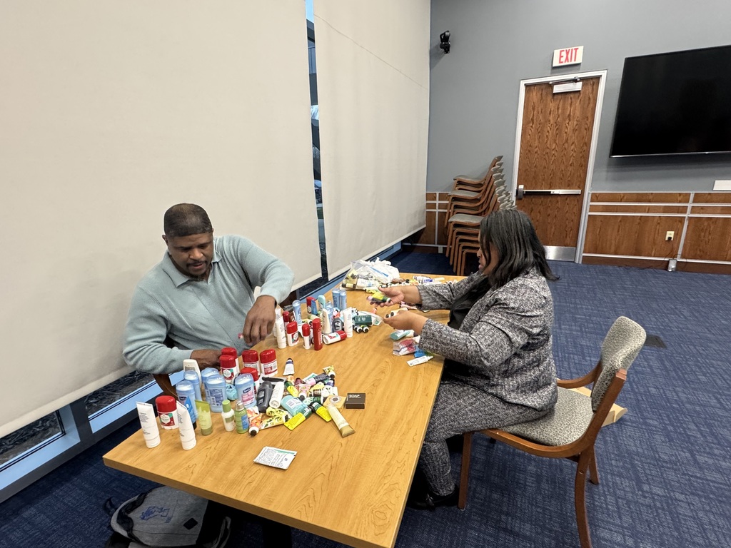 Two people sorting products
