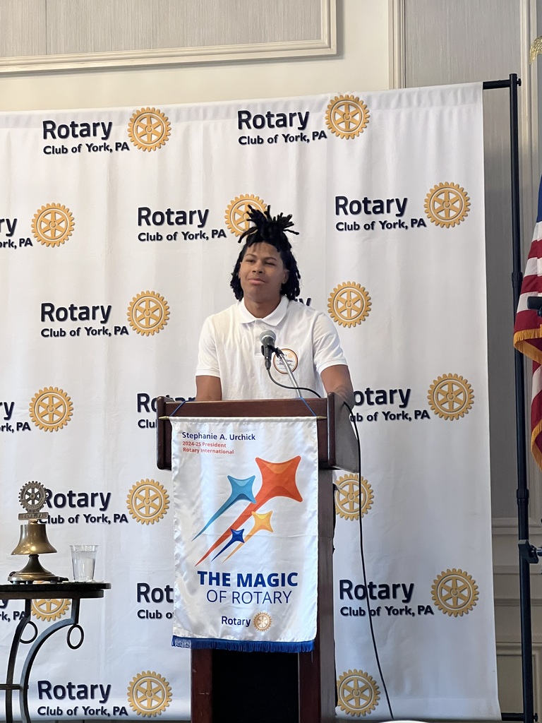 A person standing at a podium