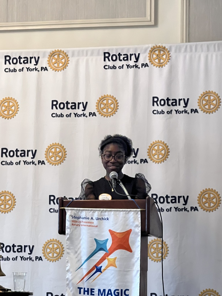 A person standing at a podium