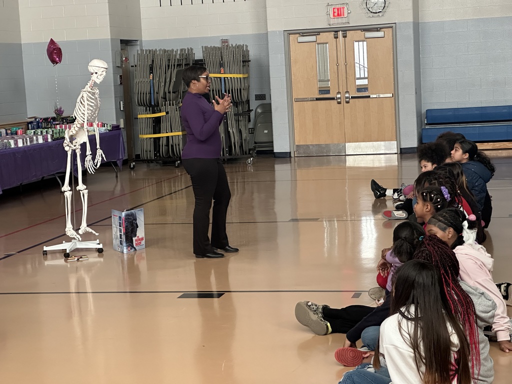 An adult giving a presentation