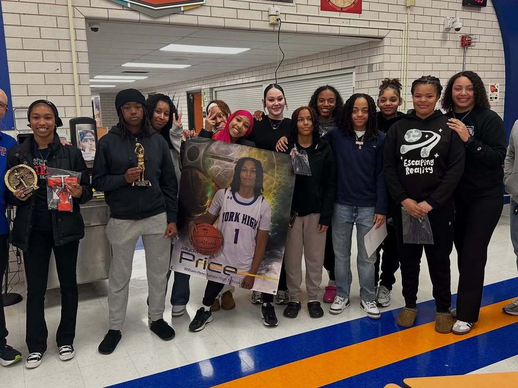 A group of people smiling