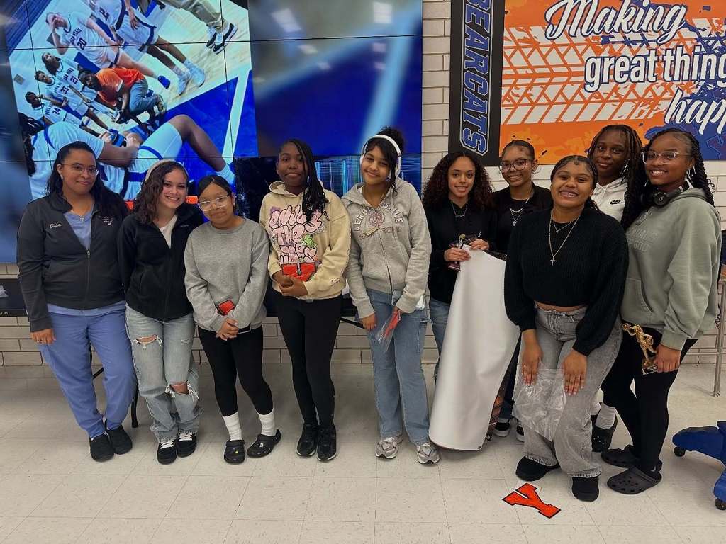 A group of people smiling