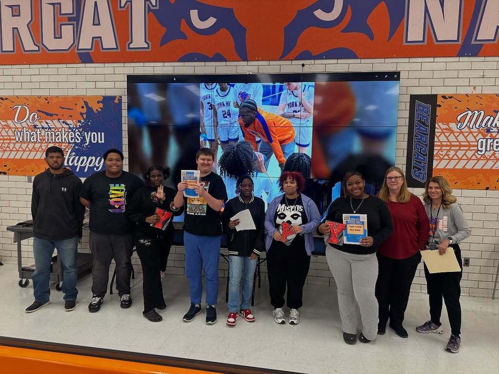 A group of people smiling