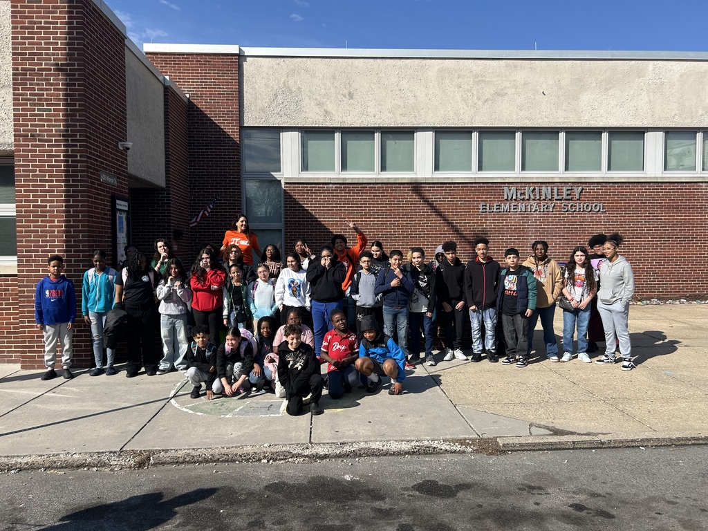 Group photo of students and teacher