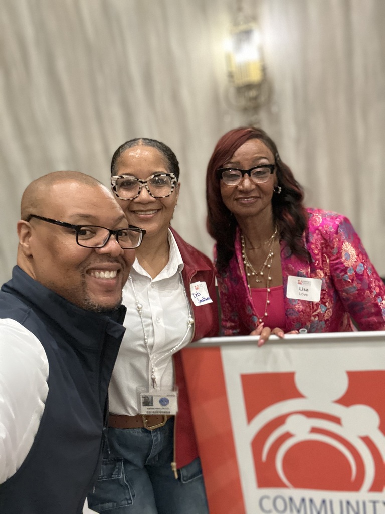 Group of people smiling for a photo