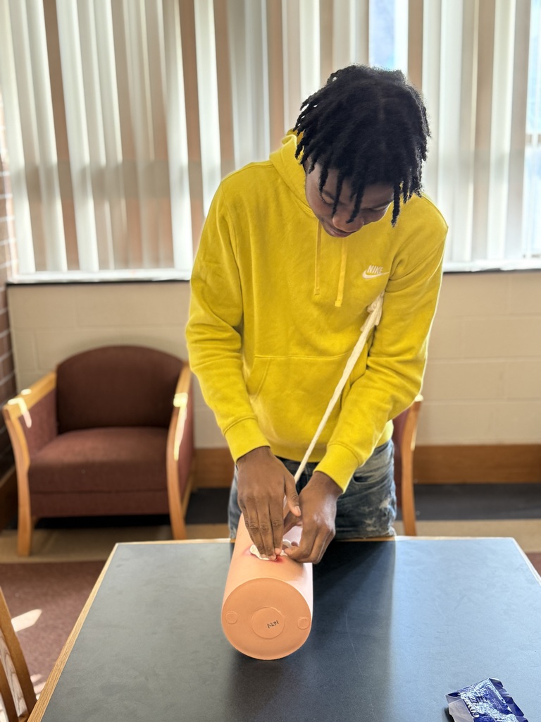 Student participating in a Stop the Bleed training