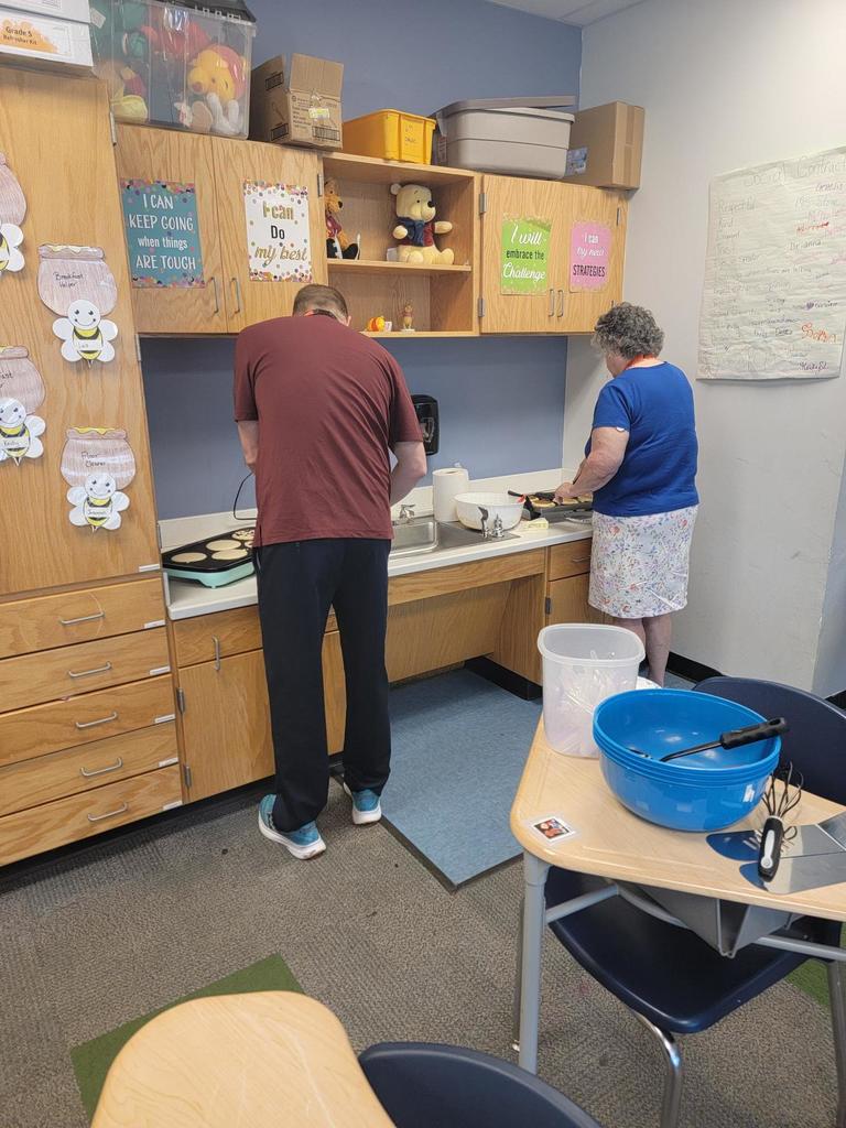 Group of adults cooking
