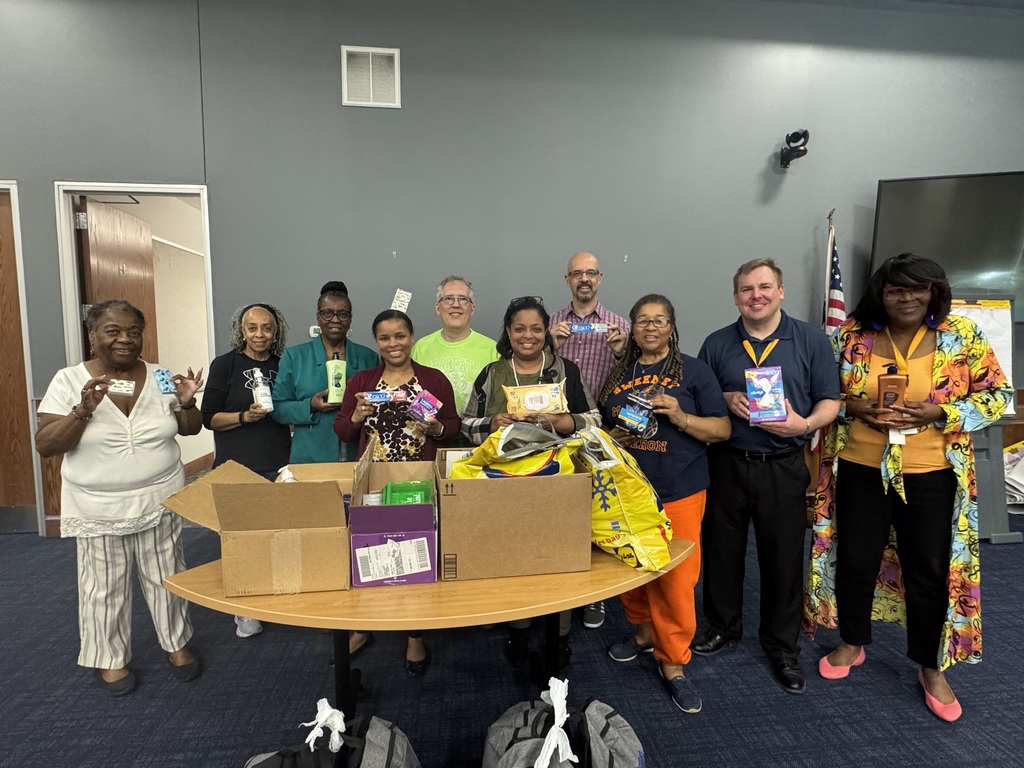 Group of people holding up hygiene products