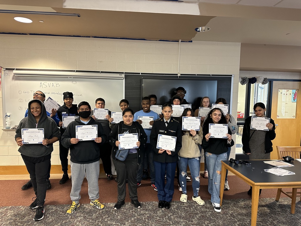Student of the Month Celebration - Group of students holding up certificates