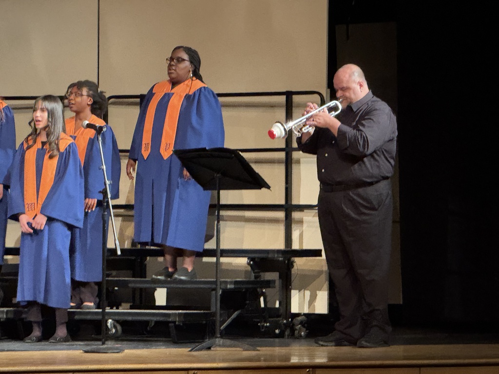WPSHS Spring Choral Concert - Choir singing and teacher playing an instrument