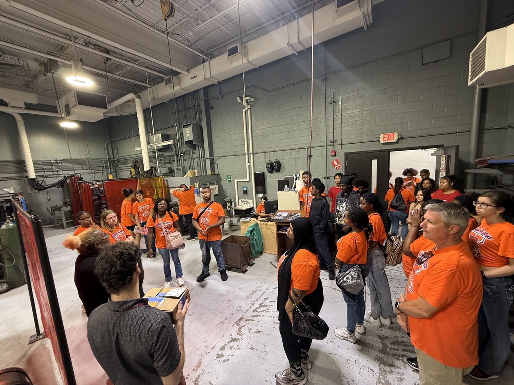 Group of students receiving a tour of Harrisburg Area Community College's (HACC) Campus.