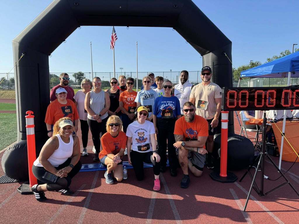 District staff posing for a group photo before the start of the School District of the City of York's 5K Run and Walk.