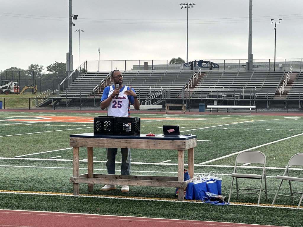 Keynote Speaker and Bearcat Alumni, Clovis Gallon delivering a motivational message at the School District of the City of York's 2025-2026 Opening Kick-Off Day.