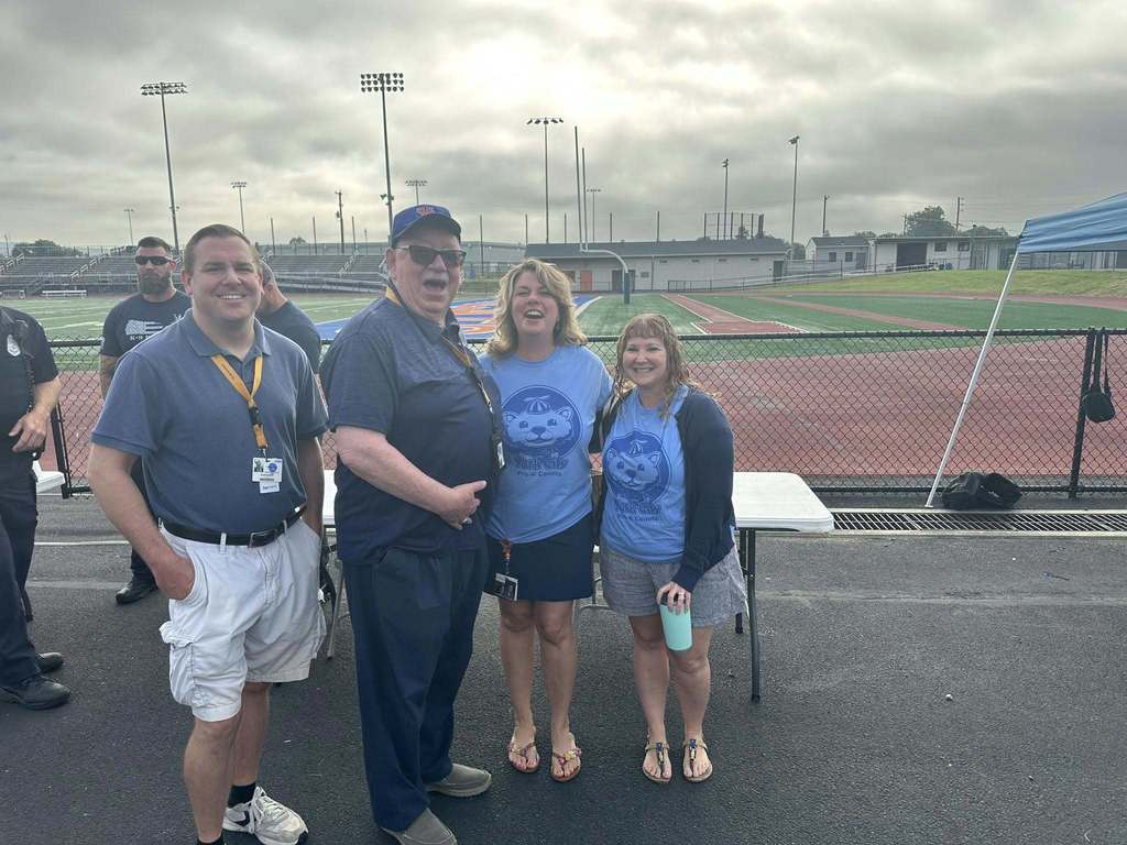 School Board Member and district staff posing together at the School District of the City of York's 2025-2026 Opening Kick-Off Day.